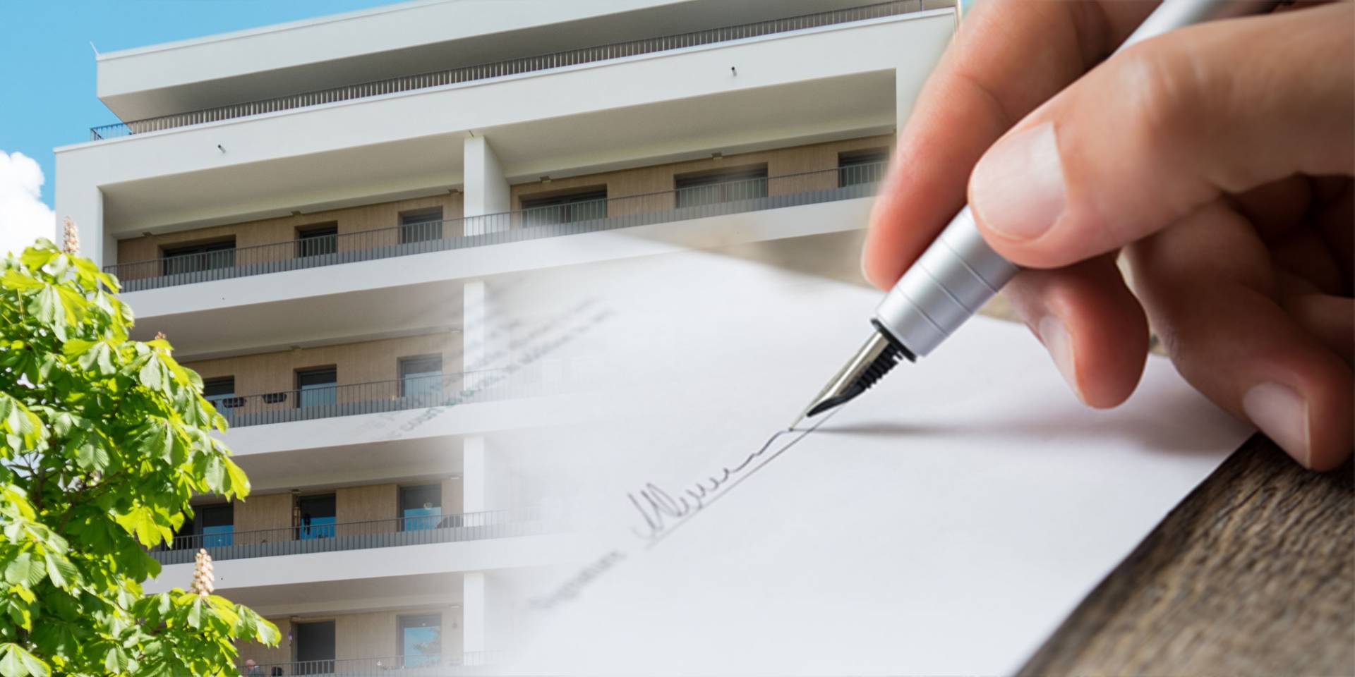 Hand mit Füller und Unterschrift