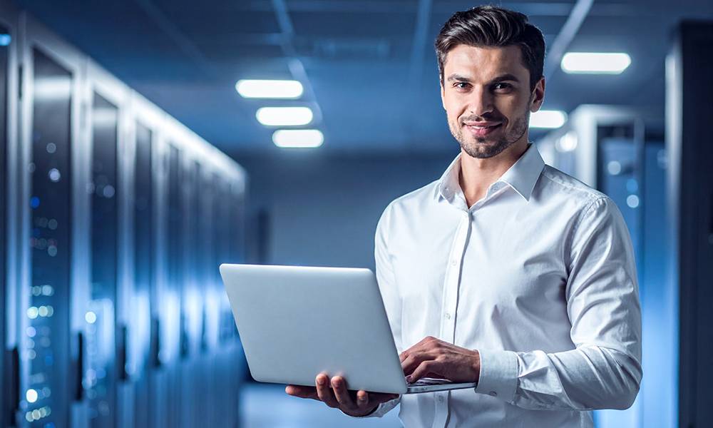 Geschäftsmann mit Laptop